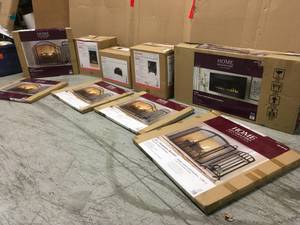 Pallet with Assorted Fireplaces and accesories customer returns various models and conditions
