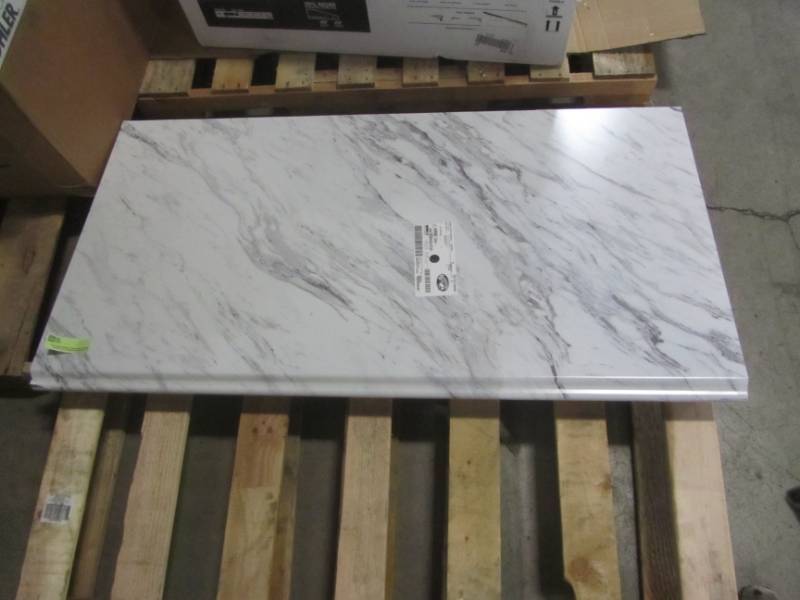 lot 306 image: Hampton Bay 4 ft. Laminate Countertop in Calcutta Marble with Premium Textured Gloss Finish and Valencia Edge 12337KT04N4925