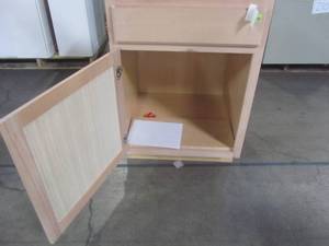 lot 213 image: Hampton Bay Assembled 24x34.5x24 in. Base Kitchen Cabinet in Unfinished Beech KB24-UFDF