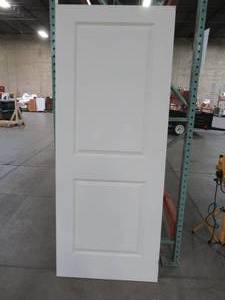 lot 610 image: Jeld-wen 32 x 80 Cambridge Primed Smooth Molded Composite MDF Interior Door Slab