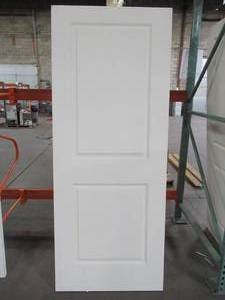 lot 611 image: Jeld-wen 32 x 80 Cambridge Primed Smooth Molded Composite MDF Interior Door Slab.