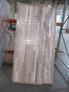 lot 618 image: Approximately 72 x 38 x 1.5 Thick Island Butcher Block Countertop in Unfinished Walnut - Cracked 1 Pcs about 11 14 2nd Pcs about 28 Needs to be gluedfixed.