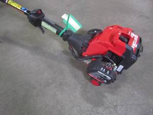 lot 827 image: CRAFTSMAN 25-cc 2-cycle 17-in Curved Shaft Gas String Trimmer with Attachment and Edger Capability CMXGTAMD25CC