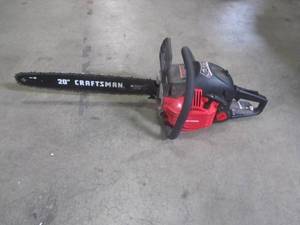 lot 828 image: CRAFTSMAN 46-cc 2-cycle 20-in Gas Chainsaw CMXGSAMY462S