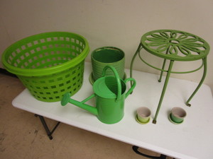 lot 329 image: GREEN GARDEN DECOR, DECORATIVE TABLE, WATERING CAN, POTS, BASKET,