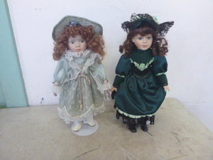 2 Porcelain Dolls