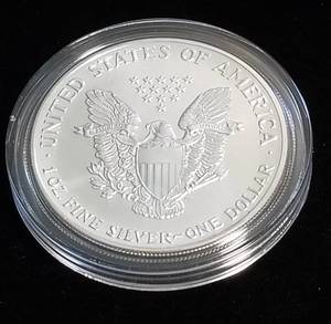 1990 AMERICAN SILVER EAGLE 1 TROY OZ. .999 FINE SILVER IN AIRTITE