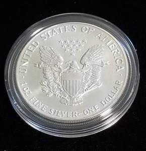 1991 AMERICAN SILVER EAGLE 1 TROY OZ. .999 FINE SILVER IN AIRTITE