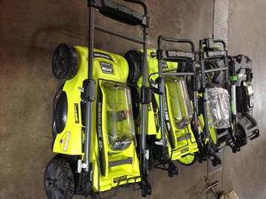 GAYLORD WITH RYOBI & EGO ELECTRIC MOWERS SEE PICS IN WORKING CONDITIONS 1 BATTERY AND 1 CHARGER MOSTLY ALL MISSING BAGS