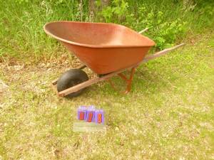 lot 8 image: True Temper wheel barrow. As shown.