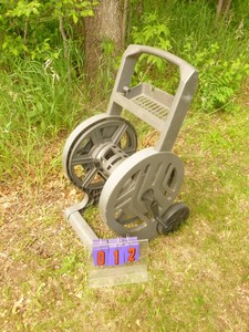 lot 12 image: Sun cast Hose reel. Nice shape. As shown.