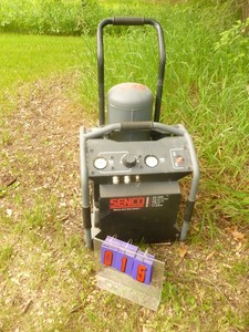 lot 15 image: Senco air compressor. 4.9 cfm. Tested & works. Very nice shape. As shown.
