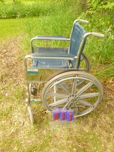 lot 17 image: Health Call wheel chair. No foot rests included. As shown.