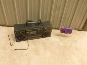 lot 22 image: Panasonic boom box with cd player. Tested & works. As shown.