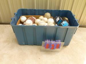 lot 30 image: Large tub of softballs. As shown.