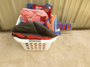 lot 36 image: Bin of life vest. Adult & youth size. As shown.