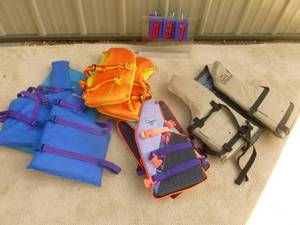 lot 37 image: Bin of life vest. Adult & youth size. As shown.