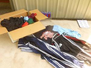 lot 40 image: Huge box of Andover girls softball jerseys & pants. As shown.