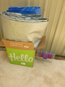 lot 70 image: Box of large tarps. Used very little. As shown.