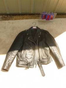 lot 95 image: Size 12 womens leather cycle jacket. Nice shape. As shown.