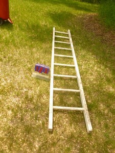 lot 103 image: 9 wood ladder. As shown.