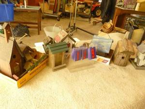 lot 109 image: Large assortment of bird houses & feeders. As shown.