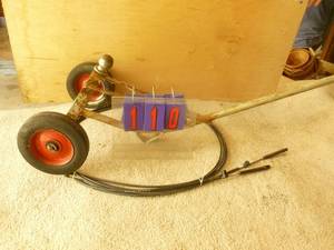 lot 110 image: Trailer dolly & outboard control cables. As shown.