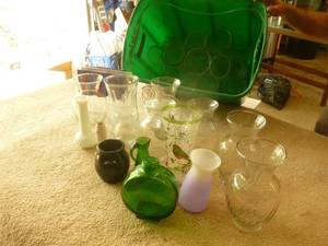 lot 111 image: Large qty of glass flower vases. Approx 25. As shown.