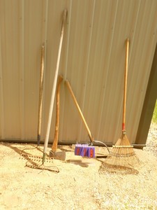 lot 119 image: Craftsman axe & yard tools. As shown.