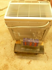 lot 123 image: Kenmore 10000 btu air conditioner. 110 volt. Tested & works. As shown.