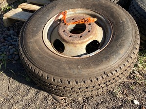 lot 24 image: (3) Assorted Truck Wheels  Tires