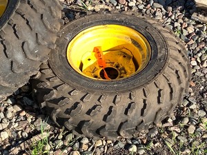 lot 21 image: (2) ATV Wheels & Tires