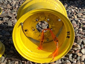 lot 18 image: (2) Lawn Mower Wheels