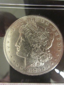lot 104 image: UNCIRCULATED 1879 MORGAN SILVER DOLLAR