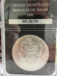lot 105 image: UNCIRCULATED 1880 MORGAN SILVER DOLLAR