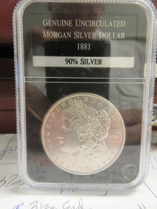 lot 106 image: UNCIRCULATED 1881 MORGAN SILVER DOLLAR