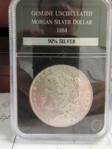 lot 109 image: UNCIRCULATED 1884 MORGAN SILVER DOLLAR