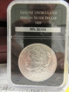 lot 114 image: UNCIRCULATED 1889 MORGAN SILVER DOLLAR
