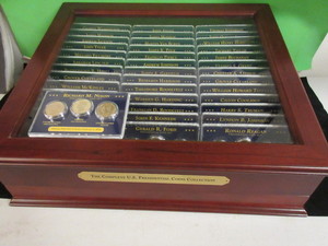 lot 130 image: US PRESIDENTIAL COIN COLLECTION GOLD TONE DOLLAR COINS WITH CASE