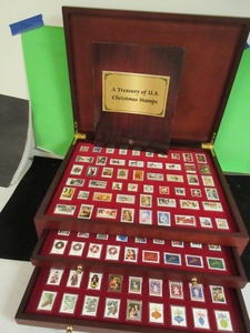 lot 135 image: A TREASURY OF US CHRISTMAS STAMPS WITH DISPLAY CASE