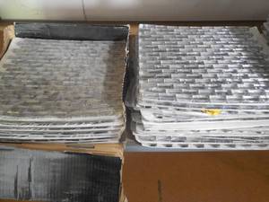 lot 123 image: Treasure Bell Grey 11-78 in. x 12 in. x 8 mm Interlocking Textured Glass Mosaic Tile 16 SQUARE FEET