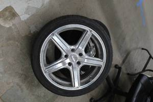 Set of (4) Milestar P23540R18 Tire with American Racing 18in. Chrome Wheels