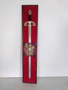 lot 148 image: Wooden Board with Sword