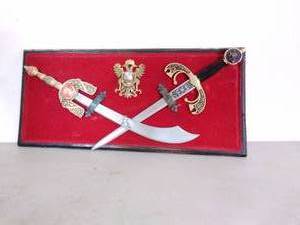 lot 149 image: Wooden Board with Two Daggers
