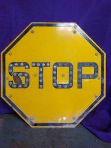 lot 23 image: Stop Sign with cats eyes