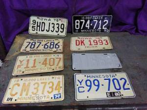 lot 56 image: 8 Vintage License Plates