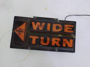 lot 160 image: Lighted WIDE TURN Sign