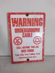 lot 173 image: WARNING UNDERGROUND CABLE Sign