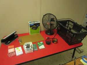 lot 631 image: DIGITAL POSTAL SCALE - NEW, TABLE FAN, ADJUSTABLE PAPER PUNCH,  OFFICE SUPPLIES, BASKET, MORE.