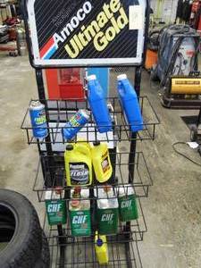 lot 121 image: Amoco Stand w Liquids